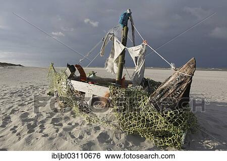 "Ship built from flotsam on the beach, Langeoog, Ostfriesische Inseln, Lower Saxony, Germany, Europe" View Large Photo Image Stock Photograph - "Ship built from flotsam on the beach, Langeoog, Ostfriesische Inseln, Lower Saxony, Germany, Europe". Fotosearch