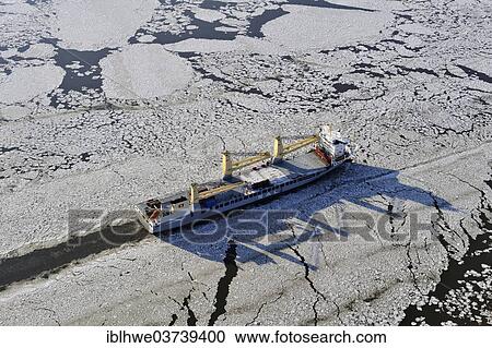 "Ship on the Elbe River with ice flow, aerial view, Hamburg, Hamburg, Germany, Europe" View Large Photo Image Stock Image - "Ship on the Elbe River with ice flow, aerial view, Hamburg, Hamburg, Germany, Europe". Fotosearch