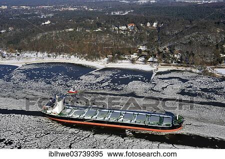 "Ship on the Elbe River with ice flow, aerial view, Hamburg, Hamburg, Germany, Europe" View Large Photo Image Stock Photography - "Ship on the Elbe River with ice flow, aerial view, Hamburg, Hamburg, Germany, Europe". Fotosearch
