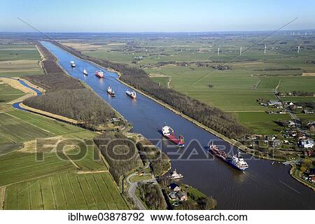 "Ship traffic on the Kiel Canal or Nord-Ostsee-Kanal, Brunsbuttel, Schleswig-Holstein, Germany, Europe" View Large Photo Image Stock Image - "Ship traffic on the Kiel Canal or Nord-Ostsee-Kanal, Brunsbuttel, Schleswig-Holstein, Germany, Europe". Fotosearch