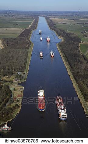 "Ship traffic on the Kiel Canal or Nord-Ostsee-Kanal, Brunsbuttel, Schleswig-Holstein, Germany, Europe" View Large Photo Image Stock Photograph - "Ship traffic on the Kiel Canal or Nord-Ostsee-Kanal, Brunsbuttel, Schleswig-Holstein, Germany, Europe". Fotosearch