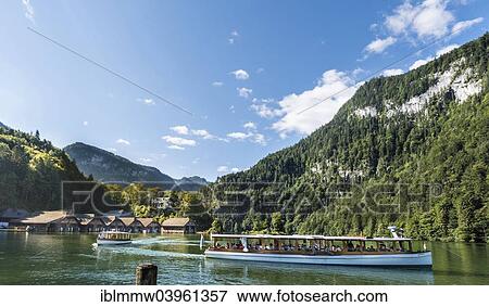 "Ship with boathouses in Schonau am Konigssee, Konigssee Seelande, Lake Konigssee, Berchtesgaden National Park, Berchtesgadener Land district, Upper Bavaria, Bavaria, Germany, Europe" View Large Photo Image Stock Photo - "Ship with boathouses in Schonau am Konigssee, Konigssee Seelande, Lake Konigssee, Berchtesgaden National Park, Berchtesgadener Land district, Upper Bavaria, Bavaria, Germany, Europe". Fotosearch
