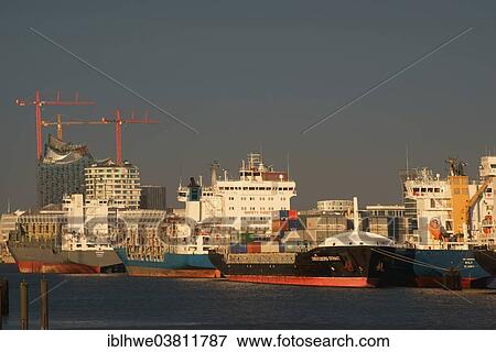 "Ships in the Port of Hamburg at anchor in the North Elbe, Elbe Philharmonic Hall and the Marco Polo Tower in the back, Hamburg, Germany, Europe" View Large Photo Image Stock Photo - "Ships in the Port of Hamburg at anchor in the North Elbe, Elbe Philharmonic Hall and the Marco Polo Tower in the back, Hamburg, Germany, Europe". Fotosearch