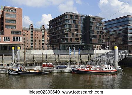 "Ships moored at Tall Ship Harbour, Traditionsschiffhafen harbour, historic harbour with modern residential and office buildings, Sandtorhafen harbour, Sandtorkai street, HafenCity, Hamburg, Hamburg, Germany, Europe" View Large Photo Image Stock Image - "Ships moored at Tall Ship Harbour, Traditionsschiffhafen harbour, historic harbour with modern residential and office buildings, Sandtorhafen harbour, Sandtorkai street, HafenCity, Hamburg, Hamburg, Germany, Europe". Fotosearch