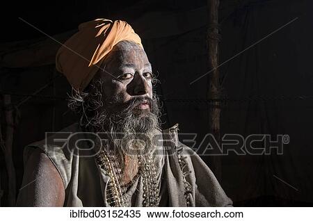 "Shiva sadhu, holy man, at night at the Sangam, the confluence of the rivers Ganges, Yamuna and Saraswati, during Kumbha Mela festival, Allahabad, Uttar Pradesh, India, Asia" View Large Photo Image Stock Photography - "Shiva sadhu, holy man, at night at the Sangam, the confluence of the rivers Ganges, Yamuna and Saraswati, during Kumbha Mela festival, Allahabad, Uttar Pradesh, India, Asia". Fotosearch