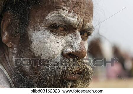 Stock Photo - "Shiva sadhu, holy man, at the Sangam, the confluence of the rivers Ganges, Yamuna and Saraswati, during Kumbha Mela festival, Allahabad, Uttar Pradesh, India, Asia". Fotosearch