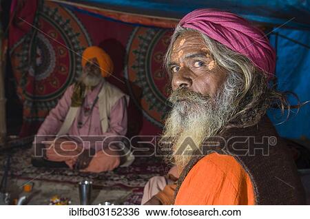 "Shiva sadhu, holy man, at the Sangam, the confluence of the rivers Ganges, Yamuna and Saraswati, during Kumbha Mela festival, Allahabad, Uttar Pradesh, India, Asia" View Large Photo Image Stock Photograph - "Shiva sadhu, holy man, at the Sangam, the confluence of the rivers Ganges, Yamuna and Saraswati, during Kumbha Mela festival, Allahabad, Uttar Pradesh, India, Asia". Fotosearch