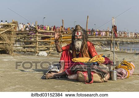 "Shiva sadhu, holy man, sitting at the Sangam, the confluence of the rivers Ganges, Yamuna and Saraswati, during Kumbha Mela festival, Allahabad, Uttar Pradesh, India, Asia" View Large Photo Image Picture - "Shiva sadhu, holy man, sitting at the Sangam, the confluence of the rivers Ganges, Yamuna and Saraswati, during Kumbha Mela festival, Allahabad, Uttar Pradesh, India, Asia". Fotosearch