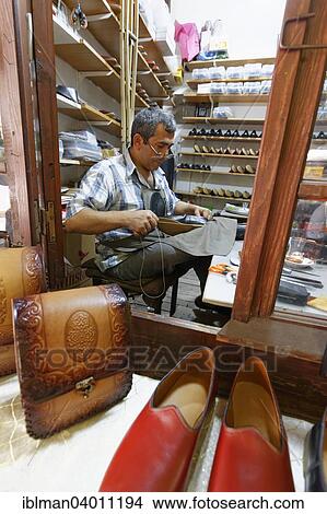 "Shoemaker in Yemeniciler Bazaar or Yemeniciler Arastasi, Safranbolu, Karabuk province, Black Sea region, Turkey, Asia" View Large Photo Image Picture - "Shoemaker in Yemeniciler Bazaar or Yemeniciler Arastasi, Safranbolu, Karabuk province, Black Sea region, Turkey, Asia". Fotosearch