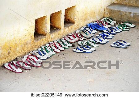 "Shoes, flip-flops lying in front of a monastery in Bagan, Burma, Myanmar, Southeast Asia, Asia" View Large Photo Image Stock Photo - "Shoes, flip-flops lying in front of a monastery in Bagan, Burma, Myanmar, Southeast Asia, Asia". Fotosearch