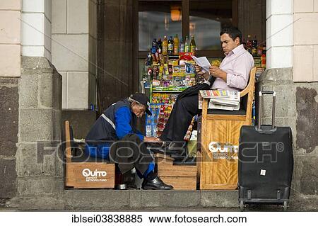 "Shoeshine boy serving a client, Quito, Ecuador, South America" View Large Photo Image Stock Photography - "Shoeshine boy serving a client, Quito, Ecuador, South America". Fotosearch