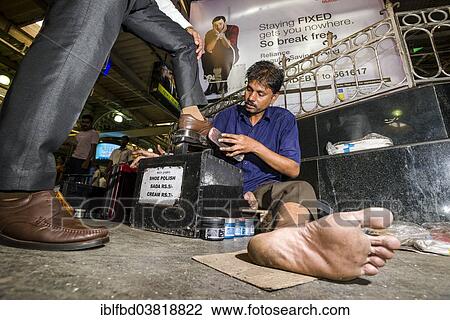 "Shoeshine working inside Churchgate Railway Station, Mumbai, Maharashtra, India, Asia" View Large Photo Image Stock Image - "Shoeshine working inside Churchgate Railway Station, Mumbai, Maharashtra, India, Asia". Fotosearch