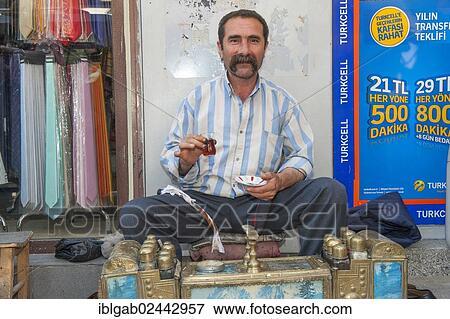 "Shoeshiner, Mardin market, Anatolia, Eastern Turkey" View Large Photo Image Stock Photo - "Shoeshiner, Mardin market, Anatolia, Eastern Turkey". Fotosearch