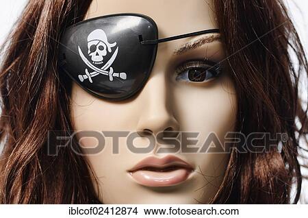 Picture - Shop-window mannequin wearing an eye patch, symbolic image for the Pirate Party of Germany. Fotosearch