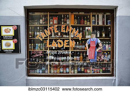 "Shop window of a """"Tante Emma Laden"""", German for """"small corner shop"""", displaying bottles, historic center, Nuremberg, Middle Franconia, Bavaria, Germany, Europe" View Large Photo Image Stock Image - "Shop window of a """"Tante Emma Laden"""", German for """"small corner shop"""", displaying bottles, historic center, Nuremberg, Middle Franconia, Bavaria, Germany, Europe". Fotosearch