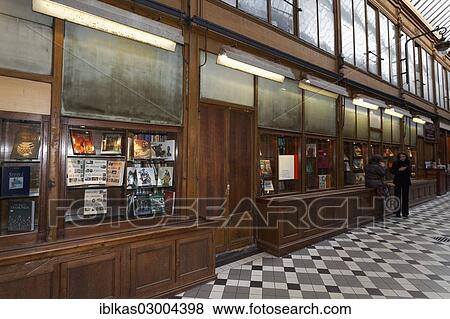Stock Photo - "Shop window of an old bookstore, historic shopping arcade, Passage Jouffroy, Grands Boulevards, 2nd Arrondissement, Paris, Ile-de-France, France, Europe". Fotosearch