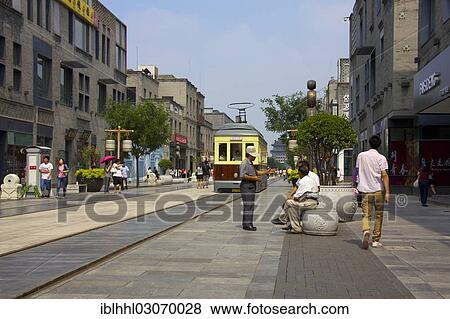 "Shopping district with a historic tram, Qianmen Strasse, Beijing, China, People's Republic of China, Asia" View Large Photo Image Stock Photo - "Shopping district with a historic tram, Qianmen Strasse, Beijing, China, People's Republic of China, Asia". Fotosearch
