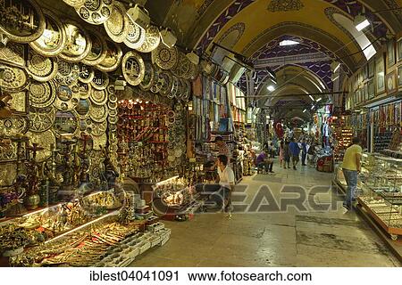 Stock Image - "Shops and people in the covered Grand Bazaar, Istanbul, Turkey, Asia". Fotosearch