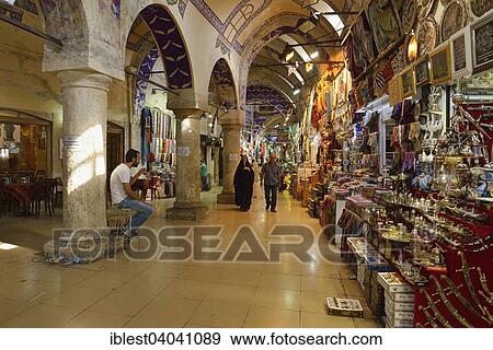 Stock Photo - "Shops and people in the covered Grand Bazaar, Istanbul, Turkey, Asia". Fotosearch