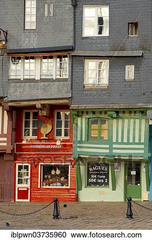 Stock Image - "Shops in a street at the harbour, Honfleur, Normandy, France, Europe". Fotosearch