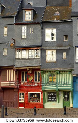 Stock Photo - "Shops in a street at the harbour, Honfleur, Normandy, France, Europe". Fotosearch