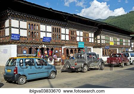 "Shops in typical Bhutanese buildings in the main street of Paro, Bhutan, Asia" View Large Photo Image Stock Image - "Shops in typical Bhutanese buildings in the main street of Paro, Bhutan, Asia". Fotosearch
