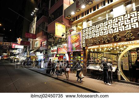 "Shops on a street in Tsim Sha Tsui at night, Kowloon, Hong Kong, China, Asia" View Large Photo Image Stock Photography - "Shops on a street in Tsim Sha Tsui at night, Kowloon, Hong Kong, China, Asia". Fotosearch