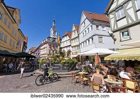 "Shops, outdoor cafes in the market square, pedestrian zone, Marktbrunnen fountain, old Town Hall, Aalen, Baden-Wuerttemberg, Germany, Europe" View Large Photo Image Stock Image - "Shops, outdoor cafes in the market square, pedestrian zone, Marktbrunnen fountain, old Town Hall, Aalen, Baden-Wuerttemberg, Germany, Europe". Fotosearch