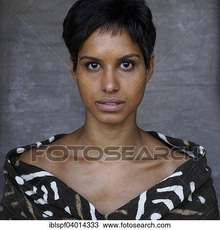 Short-haired dark-skinned woman View Large Photo Image Stock Image - Short-haired dark-skinned woman. Fotosearch