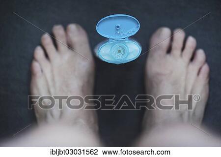 Shower gel situated between two feet in the shower View Large Photo Image Stock Image - Shower gel situated between two feet in the shower. Fotosearch