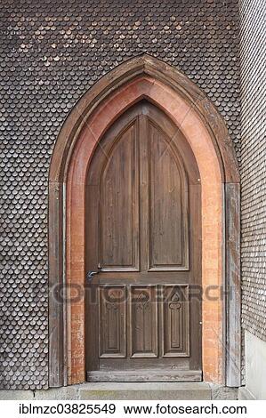 Stock Photo - "Side entrance with a shingled facade of the neo-Gothic Parish Church of St. Pelagius, 1860, Weitnau, Upper Allgau, Allgau, Swabia, Bavaria, Germany, Europe". Fotosearch