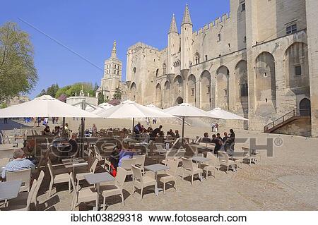 "Sidewalk cafe in front of the Palais des Papes or Papal Palace, Avignon, Vaucluse, Provence-Alpes-Cote d'Azur, Southern France, France, Europe" View Large Photo Image Stock Photo - "Sidewalk cafe in front of the Palais des Papes or Papal Palace, Avignon, Vaucluse, Provence-Alpes-Cote d'Azur, Southern France, France, Europe". Fotosearch