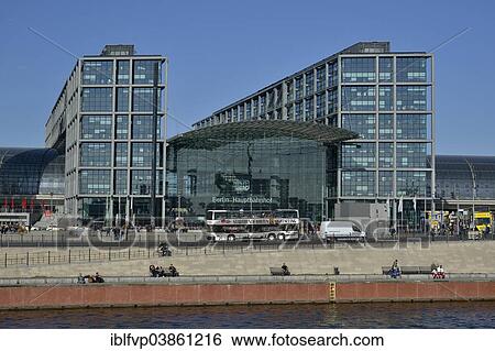 Stock Photograph - "Sightseeing bus in front of Berlin Hauptbahnhof main railway station, Spree River at the front, Berlin, Germany, Europe". Fotosearch