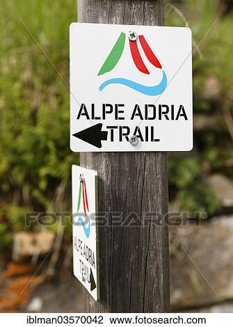 Stock Image - "Sign along the Alpe Adria Trail long-distance hiking trail, Apriach, Heiligenblut am Grossglockner, Spittal an der Drau, Carinthia, Austria, Europe". Fotosearch