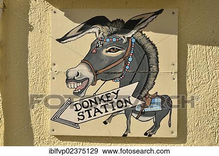 "Sign """"Donkey Station"""", in Fira or Thira, the capital of Santorini, Santorini, Cyclades, Greek island, Greece, Europe" View Large Photo Image Stock Photo - "Sign """"Donkey Station"""", in Fira or Thira, the capital of Santorini, Santorini, Cyclades, Greek island, Greece, Europe". Fotosearch