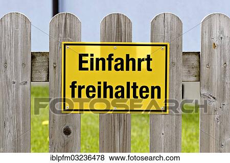 "Sign """"Einfahrt freihalten"""", German for """"Keep clear"""", on wood picket fence, Germany, Europe" View Large Photo Image Stock Photo - "Sign """"Einfahrt freihalten"""", German for """"Keep clear"""", on wood picket fence, Germany, Europe". Fotosearch