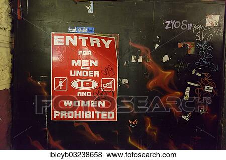 Stock Photo - "Sign """"Entry for men under 18 and women prohibited"""" at the entrance to Herbertstrasse street in the Red Light District, St. Pauli, Hamburg, Hamburg, Germany, Europe". Fotosearch