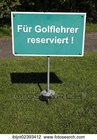 "Sign """"Fuer Golflehrer reserviert"""", German for """"reserved for golf teachers"""", at a driving range, golf course" View Large Photo Image Stock Image - "Sign """"Fuer Golflehrer reserviert"""", German for """"reserved for golf teachers"""", at a driving range, golf course". Fotosearch