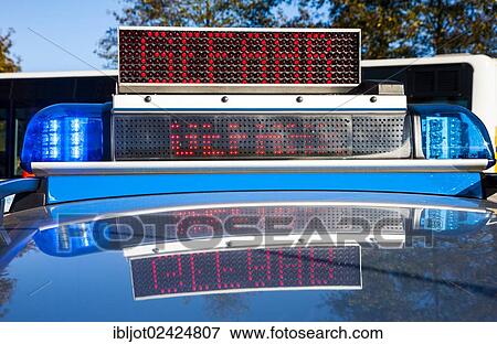 Sign Gefahr, German for danger, on the roof of a police car, emergency exercise with numerous rescue organisations and the police taking part, staged mass accident on a motorway, Duelmen, North Rhine-Westphalia, Germany, Europe View Large Photo Image Stock Photo - Sign Gefahr, German for danger, on the roof of a police car, emergency exercise with numerous rescue organisations and the police taking part, staged mass accident on a motorway, Duelmen, North Rhine-Westphalia, Germany, Europe. Fotosearch