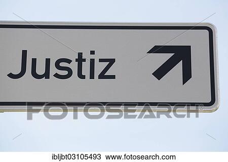 "Sign, """"Justiz"""", German for Justice, with an arrow pointing up, Cologne, Rhineland, North Rhine-Westphalia, Germany, Europe" View Large Photo Image Stock Image - "Sign, """"Justiz"""", German for Justice, with an arrow pointing up, Cologne, Rhineland, North Rhine-Westphalia, Germany, Europe". Fotosearch