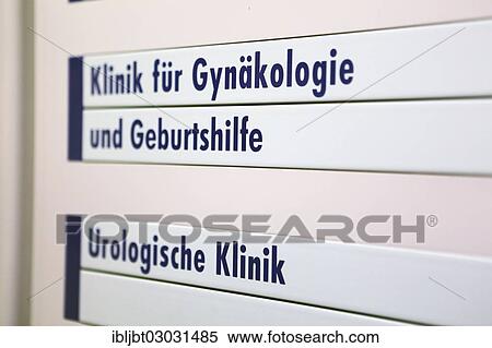 Stock Photography - "Sign """"Klinik fuer Gynaekologie und Geburtshilfe, Urologie"""", Germany for """"Department of Gynaecology and Obstetrics, Urology"""", in a hospital". Fotosearch