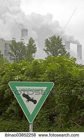 "Sign """"Landschaftsschutzgebiet"""", German for landscape conservation area, smoking chimneys of the Frimmersdorf Power Station, Grevenbroich, North Rhine-Westphalia, Germany, Europe" View Large Photo Image Stock Photo - "Sign """"Landschaftsschutzgebiet"""", German for landscape conservation area, smoking chimneys of the Frimmersdorf Power Station, Grevenbroich, North Rhine-Westphalia, Germany, Europe". Fotosearch