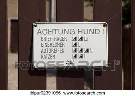 "Sign, lettering """"Achtung Hund! """", German for """"Beware of the Dog! """" with a tally sheet of its victims on a fence, Germany, Europe" View Large Photo Image Stock Photograph - "Sign, lettering """"Achtung Hund! """", German for """"Beware of the Dog! """" with a tally sheet of its victims on a fence, Germany, Europe". Fotosearch