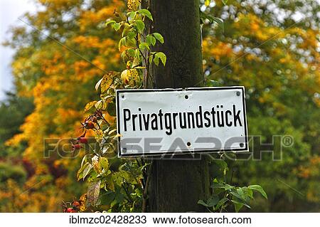 Stock Image - "Sign, lettering """"Privatgrundstueck"""", German for """"private property"""", Bruetzkow, Mecklenburg-Western Pomerania, Germany, Europe, PublicGround, Europe". Fotosearch