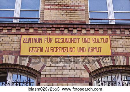 "Sign, lettering """"Zentrum fur Gesundheit und Kultur, gegen Ausgrenzung und Armut"""", German for """"Center for Health and Culture, against isolation and poverty"""", Berlin, Germany, Europe" View Large Photo Image Stock Image - "Sign, lettering """"Zentrum fur Gesundheit und Kultur, gegen Ausgrenzung und Armut"""", German for """"Center for Health and Culture, against isolation and poverty"""", Berlin, Germany, Europe". Fotosearch