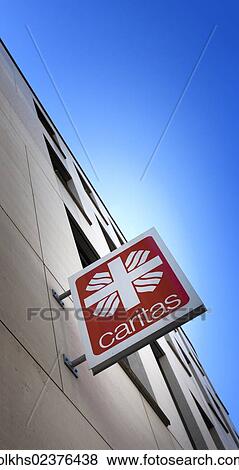 "Sign, logo of the """"Caritas"""" charity, Berlin-Mitte, Berlin, Germany, Europe" View Large Photo Image Stock Photo - "Sign, logo of the """"Caritas"""" charity, Berlin-Mitte, Berlin, Germany, Europe". Fotosearch