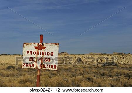 "Sign, military zone, characteristic bizarre landscape of ocher clay, semidesert Bardenas Reales, UNESCO Biosphere Reserve, Navarra, northern Spain, Spain, Europe, PublicGround, Europe" View Large Photo Image Stock Image - "Sign, military zone, characteristic bizarre landscape of ocher clay, semidesert Bardenas Reales, UNESCO Biosphere Reserve, Navarra, northern Spain, Spain, Europe, PublicGround, Europe". Fotosearch
