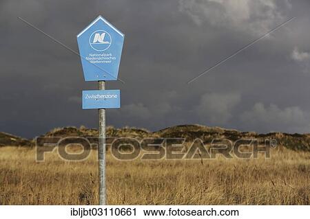 "Sign, """"Nationalpark Niedersaechsisches Wattenmeer"""", Wadden Sea National Park of Lower Saxony, Langeoog, Ostfriesische Inseln, Lower Saxony, Germany, Europe" View Large Photo Image Stock Image - "Sign, """"Nationalpark Niedersaechsisches Wattenmeer"""", Wadden Sea National Park of Lower Saxony, Langeoog, Ostfriesische Inseln, Lower Saxony, Germany, Europe". Fotosearch