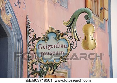 "Sign of Geigenbaumuseum, a violin making museum in the Ballenhausgasse, Mittenwald, Werdenfelser Land, Upper Bavaria, Bavaria, Germany, Europe" View Large Photo Image Stock Image - "Sign of Geigenbaumuseum, a violin making museum in the Ballenhausgasse, Mittenwald, Werdenfelser Land, Upper Bavaria, Bavaria, Germany, Europe". Fotosearch