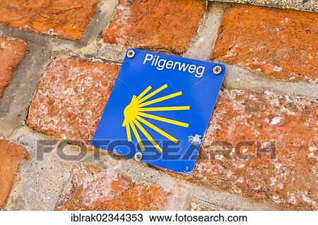 "Sign of the Way of St. James on a wall, Wismar, Mecklenburg-Western Pomerania, Germany, Europe" View Large Photo Image Stock Image - "Sign of the Way of St. James on a wall, Wismar, Mecklenburg-Western Pomerania, Germany, Europe". Fotosearch